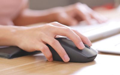 Hand using a computer mouse